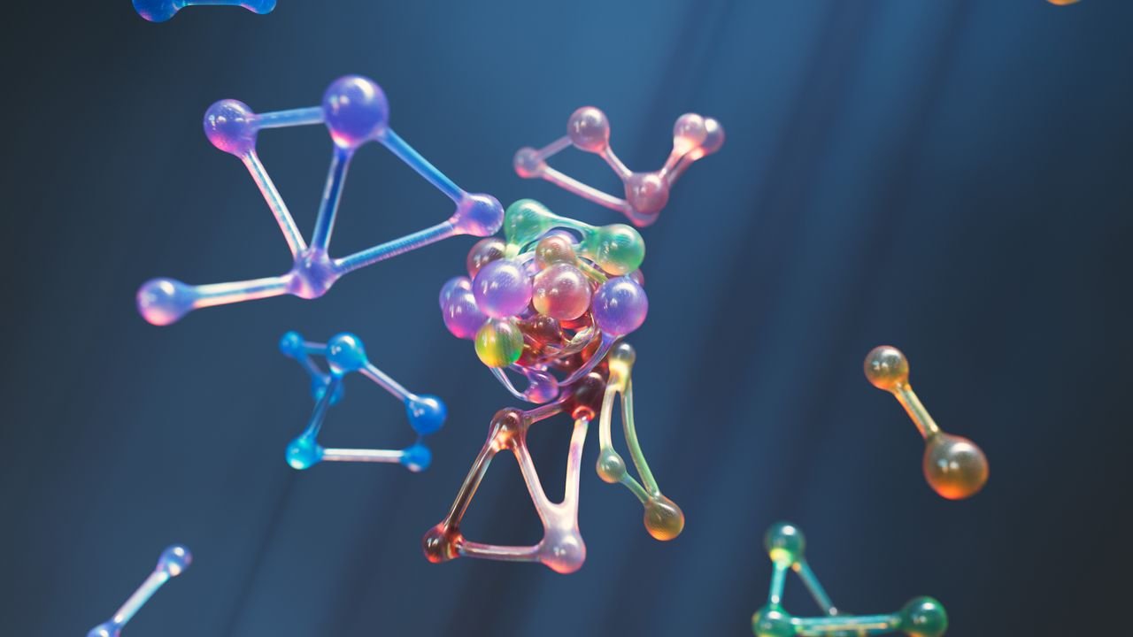 Mastering the First Impression: Your intriguing post title goes here Colorful abstract representation of molecular structures with 3D spheres and connections.